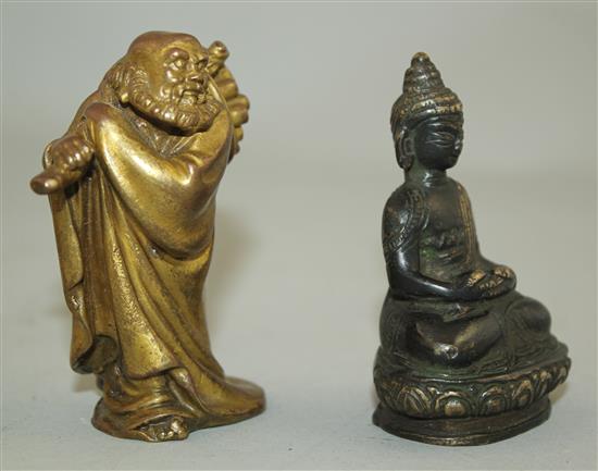 A Chinese gilt bronze figure of a sage and a South East Asian bronze figure of a Buddha, 19th century, 8cm